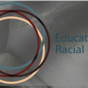 logo for Education for Racial Equity on a grey background with overlapping circles of red, blue, and yellow